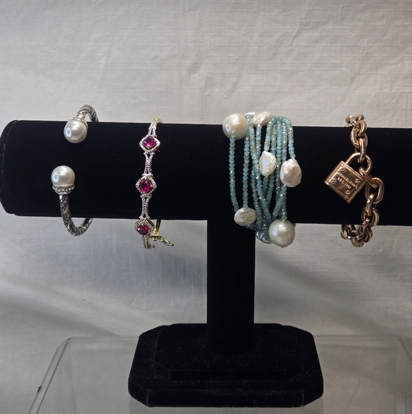 4 Beautifull Bracelets ,Michael Kors, Pearls, and Ruby's - Picture 1 of 9